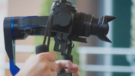 Operator with Steadicam recording video. professional photo video equipmentの写真素材
