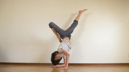 boy teenager, dancer break dance, trains in the dance hall.の写真素材