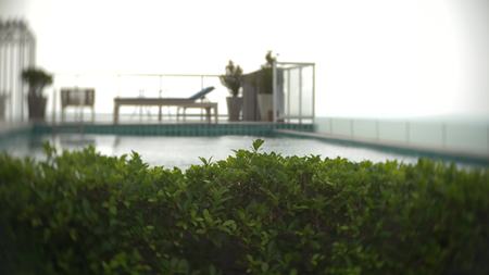 view of the pool on the roof overlooking the sea. background blur.の写真素材