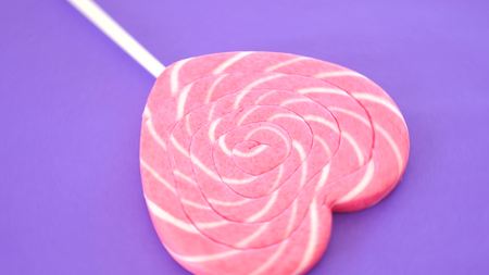 Colorful spiral lollipop in the form of a heart