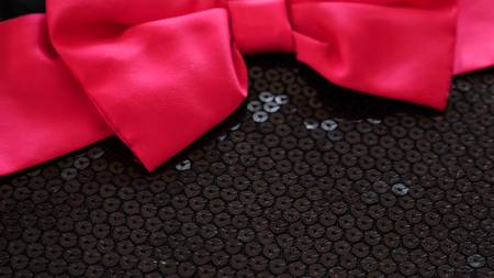 fabric as background. black knitted fabric with paillettesの写真素材