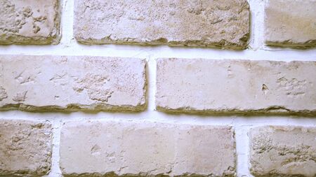Background texture. beige-pink brick loft style brick wall