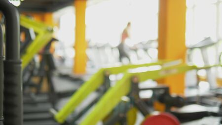 Abstract blur background. gym with people on treadmills