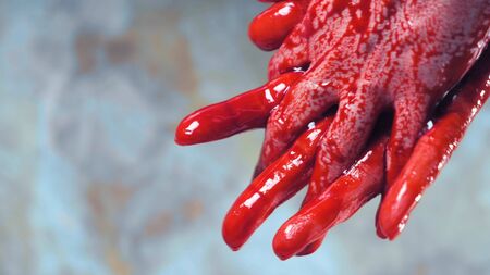 bloody hands, blood dripping from his hands. copy spaceの写真素材