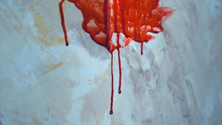 drops of blood dripping from the wall. copy space. closeupの写真素材