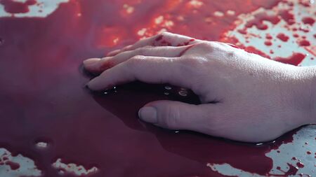 bloody hands, blood dripping from his hands. copy spaceの写真素材