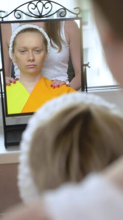 vertically. the stylist conducts a color type procedure for a womanの写真素材