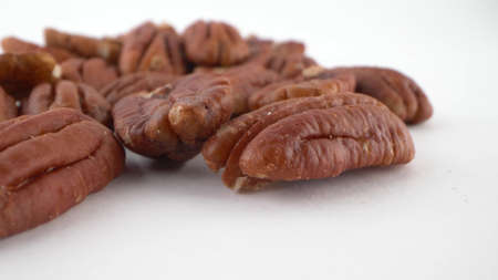 super close-up, detailed, peeled pecan isolated on white backgroundの写真素材