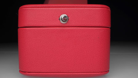 extremely close-up, detailed. red jewelry gift boxes with white ribbonの写真素材