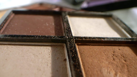 extremely close-up, detailed. palette with used cosmeticsの写真素材
