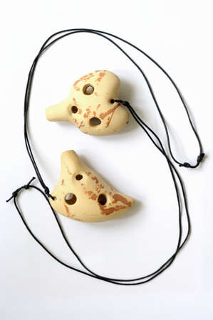A pair of clay ocarinasの写真素材