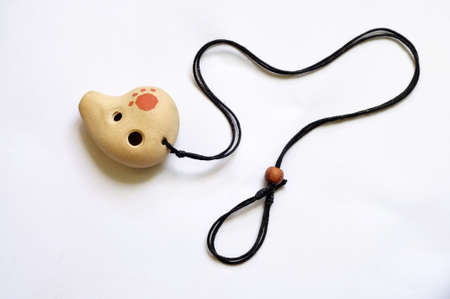  An ocarina with its strandの写真素材