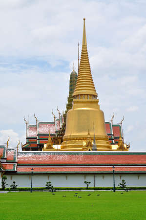 Stupa and church of Emerald Buddha temple in Thailandの写真素材