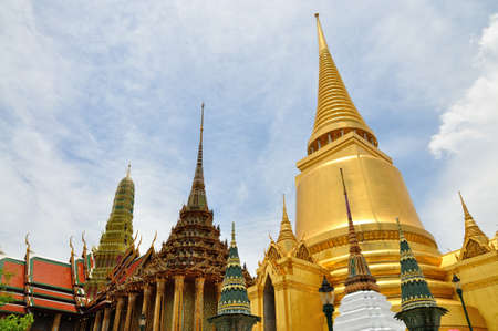 Stupa and church of Emerald Buddha temple in Thailandの写真素材