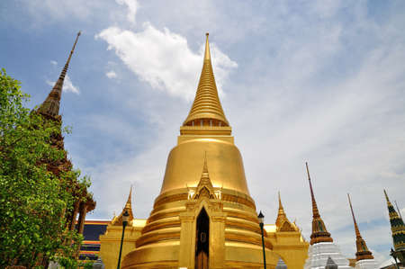 Stupa and church of Emerald Buddha temple in Thailandの写真素材