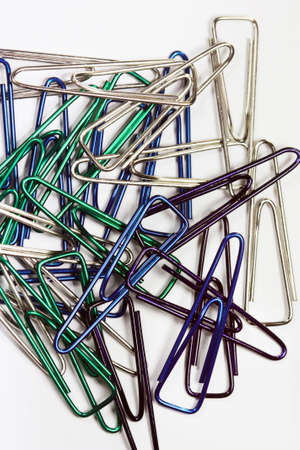 a set of steel paper clips on whiteの写真素材