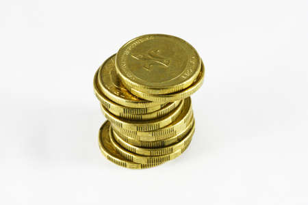 a pile of australian gold dollar coinsの写真素材