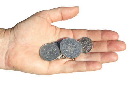 a hand holding some coins on white background