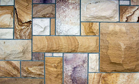 a lovely brown  slate or stone wall