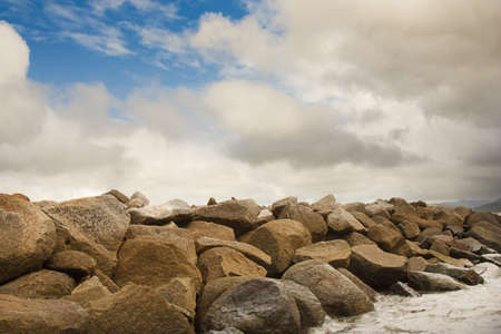 rock retainer wall  at the beach at Cooktownの写真素材