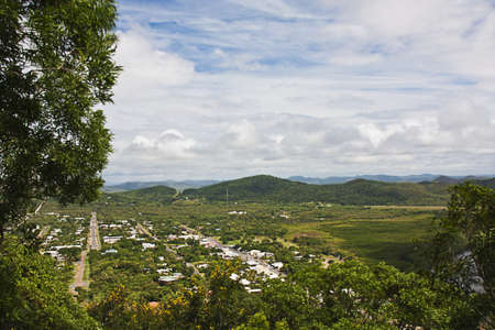 view from grassy hill overlooking the small town of Cooktown where James Cook landedの写真素材