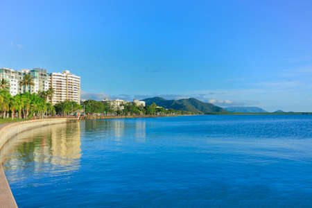 view looking across the Cairns esplanade with the tide inの写真素材