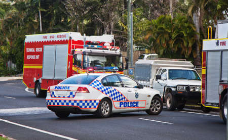 police and fire emergency vechiles at the site of a fireのeditorial素材
