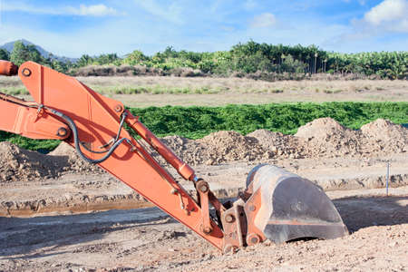 excavator preparing ground work for housing estateの写真素材