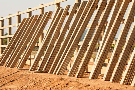 constructing a new fence in a new building areaの写真素材