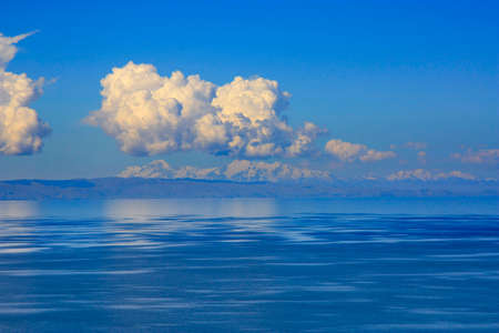 Lake Titicaca with snow-capped Ande mountains in the background a popular travel destinationの写真素材