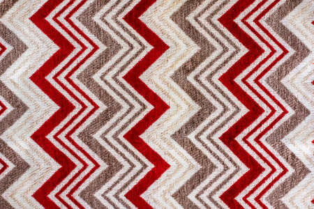 fabric with red zig zag pattern