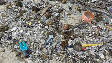 garbage and trash washed on the beach in Cape Yorkの写真素材