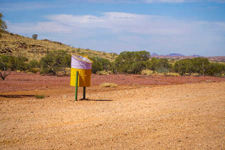 Inland Western Australia a dry land with lots of spinifex grass growing. Lots of rubbish bins provided to keep Australia cleanの写真素材