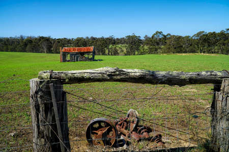 old derelict timber farm house abandoned in the countrysideの写真素材