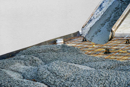setting up and pouring concreting for a path around the house