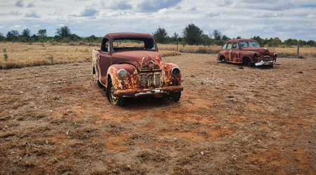 Abandoned vintage vehicles old and rusty . Outback Australian landscape with old cars.の写真素材