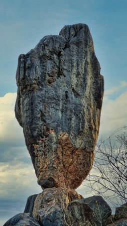 This natural wonder is a must-see for anyone visiting Chillagoe. Balancing Rock is a large boulder that seems to defy gravity, perched precariously on a smaller rock.の写真素材