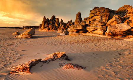 Barn Hill Station in Western Australia offers stunning views of the breathtaking coastlines of the Kimberley region. Visitors can also enjoy the mesmerizing sight of red cliffs during sunset.の写真素材