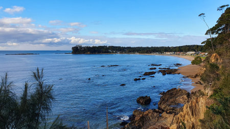 Views overlooking the beach out to Snapper Island and northeast to the Tollgate Islands, from Batehaven Observation Point Lookout in New South Wales Australiaの写真素材