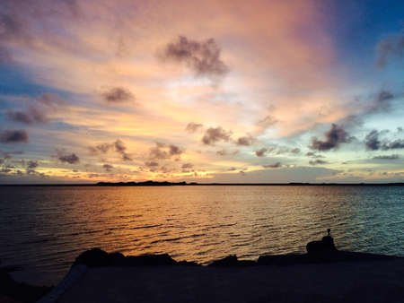 Beautiful sunset with many colors on the oceanの写真素材