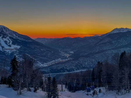 Sunset in the mountains at the ski resortの写真素材