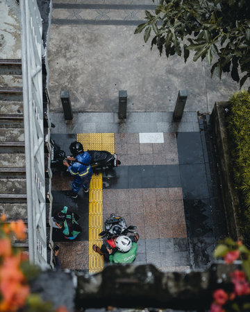 "Jakarta, Indonesia - October 2022: Online motorcycle taxis OJOL are getting ready to work again because the heavy rain has stopped"のeditorial素材