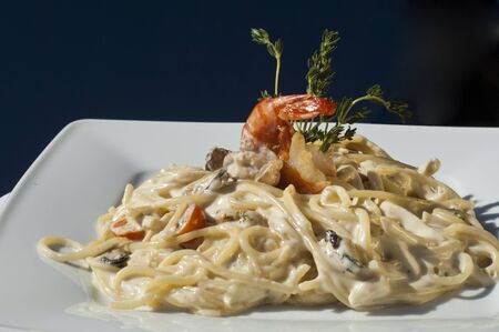 food. milk noodles, cheese, greens, shrimp, olive oilの写真素材