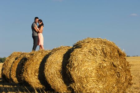 Love story  Running along the river, splashingの写真素材