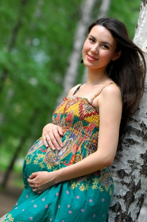 pregnant, 	expectant, enceinte,  gravid, big, 	impregnate, preggers, with child, 	big with child,  with youngの写真素材