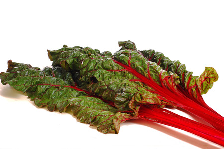 beet leaves. closeup of a backlit mangold leaf. fresh vegetables - spinach beet isolated on the...