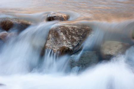 River in winter.  Ice on river in frosty winter sunset