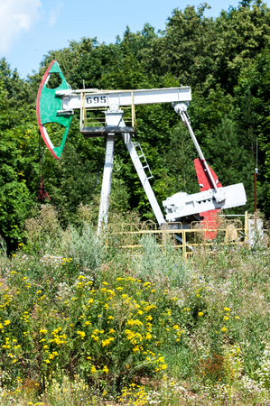 Work of oil pump jack on a oil field.の写真素材