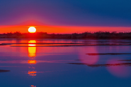 Sunrises sunsets, colorful sky, bright yellow cloudの写真素材