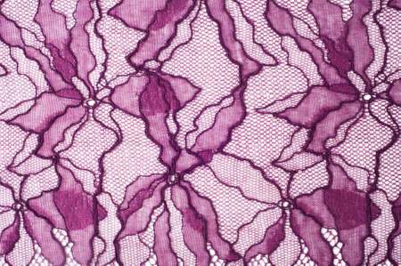 texture lace. a fine open fabric, typically one of cotton or silk, made by looping, twisting, or knitting thread in patterns and used especially for trimming garments.の写真素材